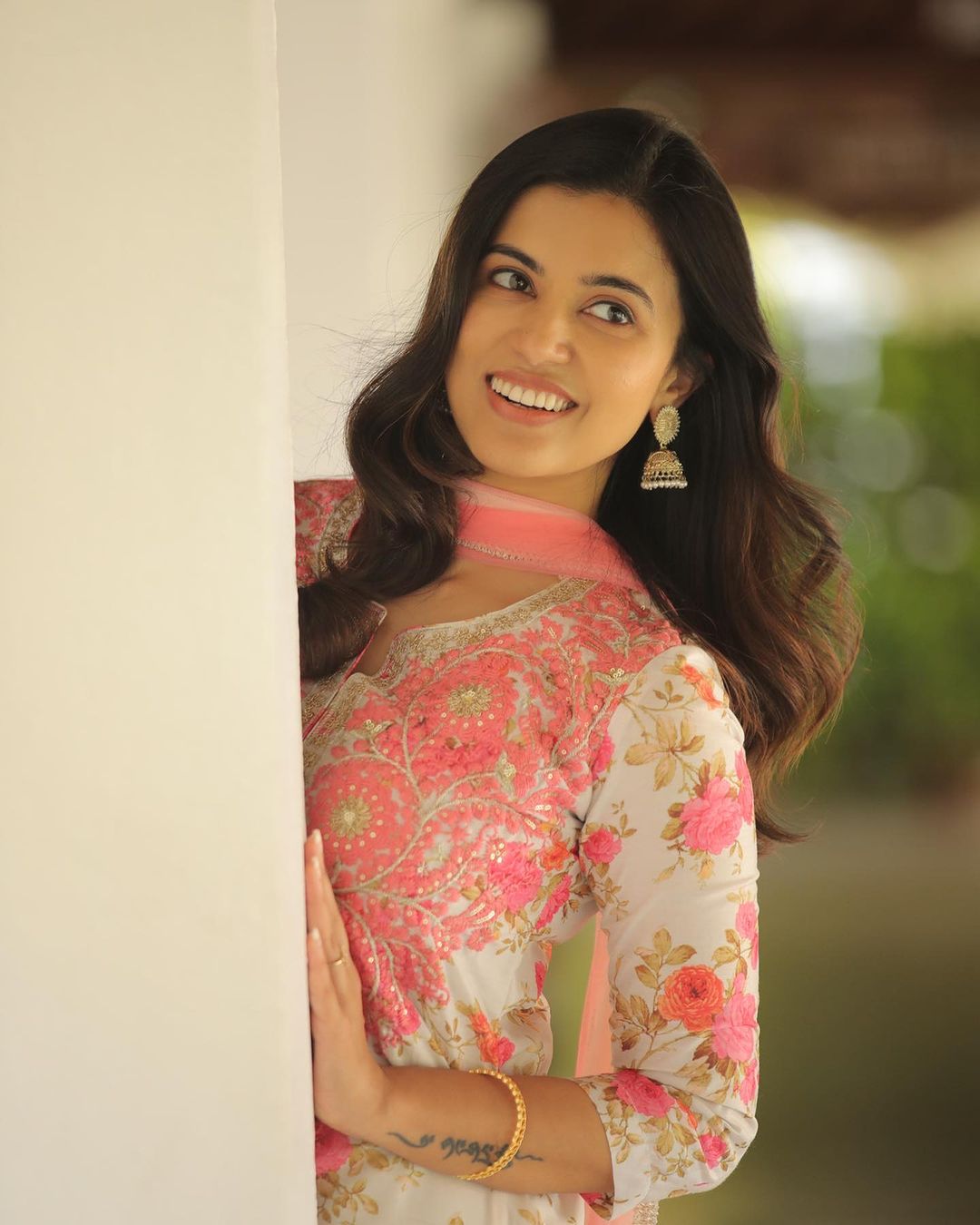 Malayalam Actress Anju Kurian Stills in Pink Color Dress